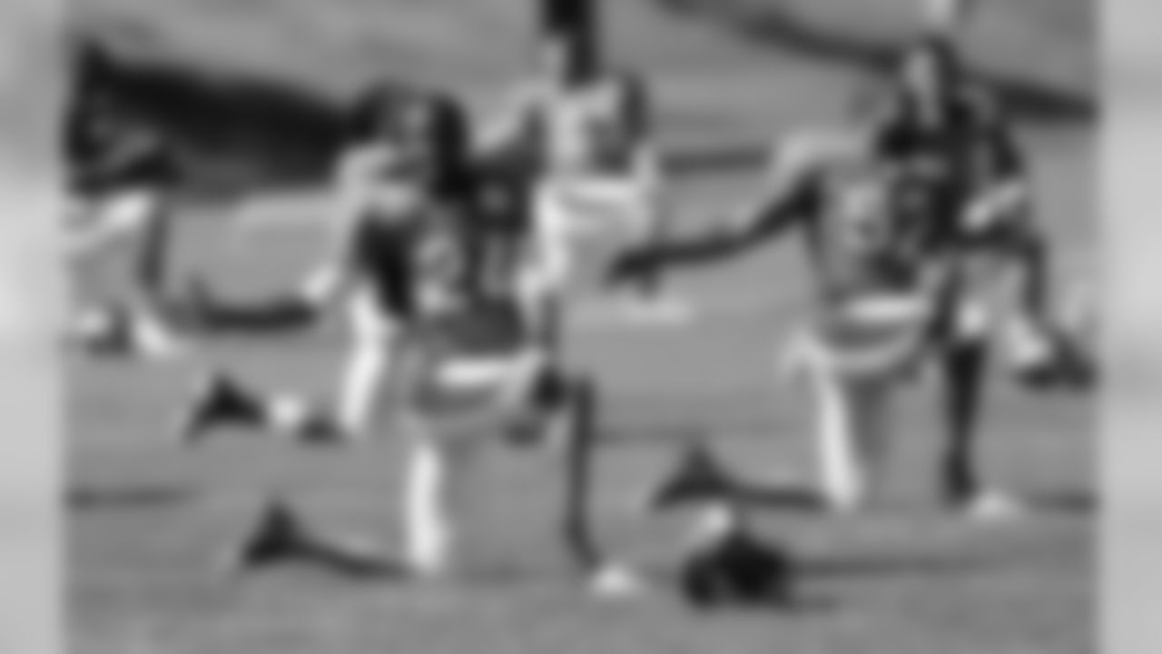 CB Champ Bailey smiles while stretching.