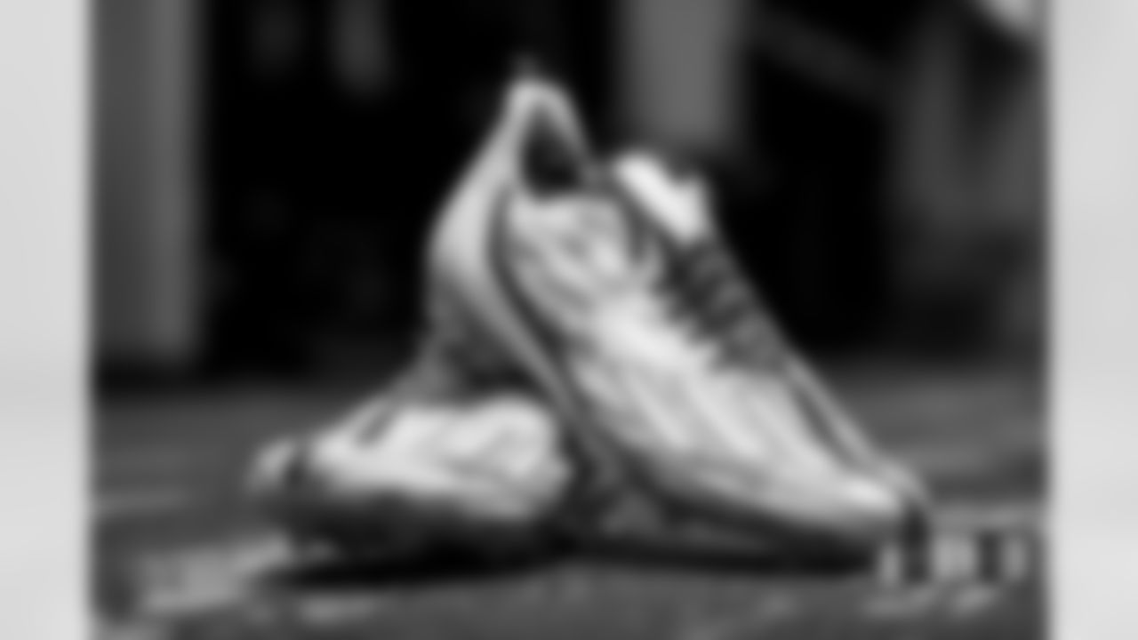 Courtland Sutton's cleats in the locker room before the Broncos' Week 4 game against the Las Vegas Raiders at Allegiant Stadium in Las Vegas, Nevada on October 2, 2022. (Photo by Gabriel Christus)