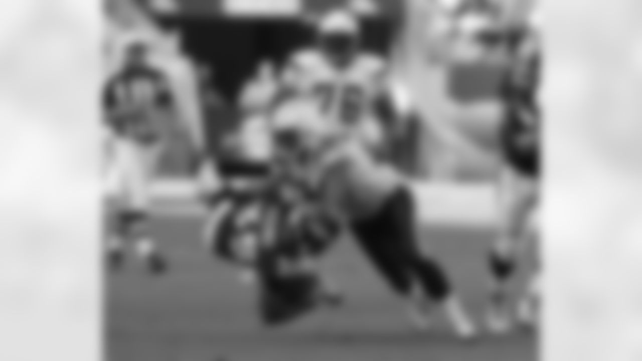 Selvin Young is tackled after a run against the Chargers.