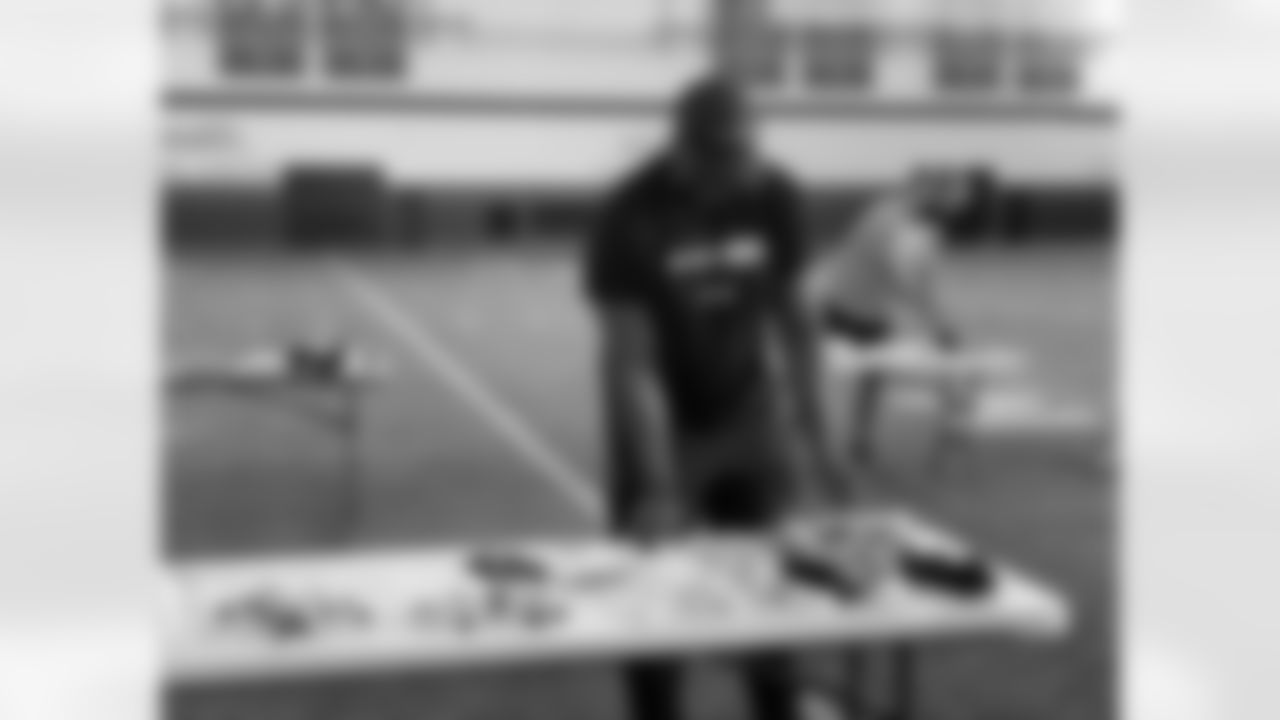 Calvin Anderson helps put together hygiene kits for the homeless.