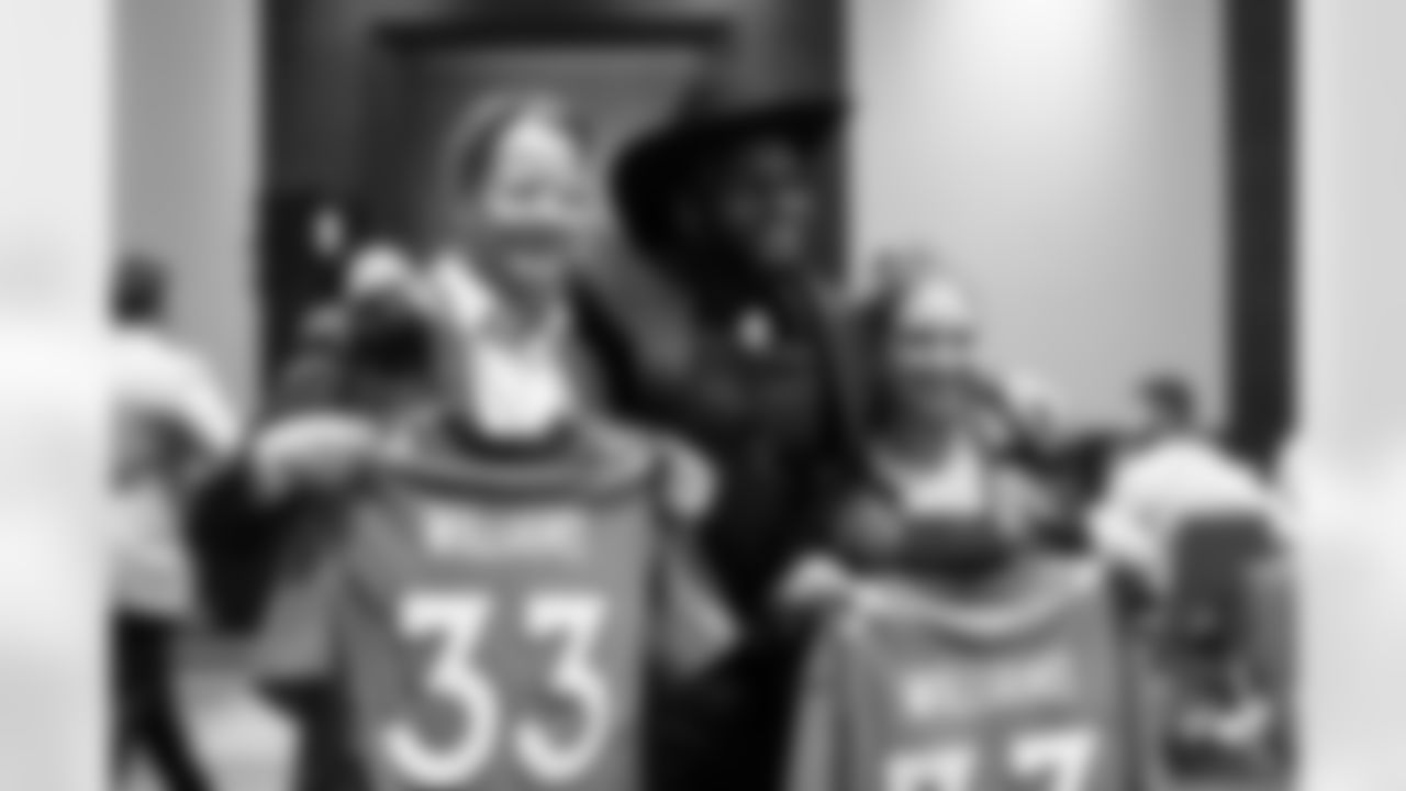 Javonte Williams poses for a photo with fans during the Javonte Williams Foundation's Mile High Celebrity Round-Up event at The Ritz-Carlton in Denver, Colorado on December 5, 2022. (Photo by Ellie Kinney)