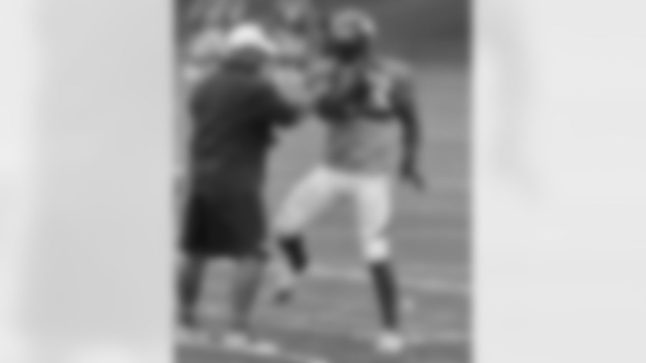 RB Willis McGahee runs through a drill.
