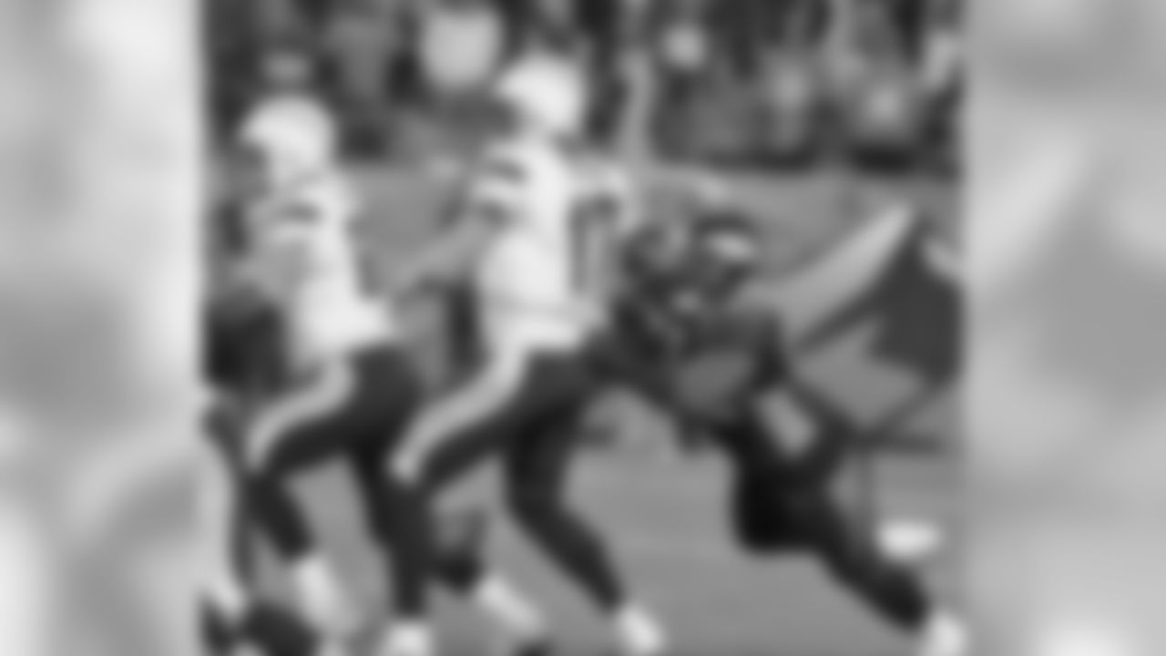 Dumervil strip-sacks Rivers to end the game.