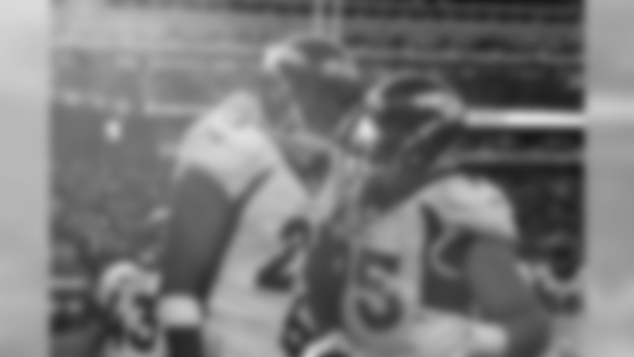 Aqib Talib and Derek Wolfe