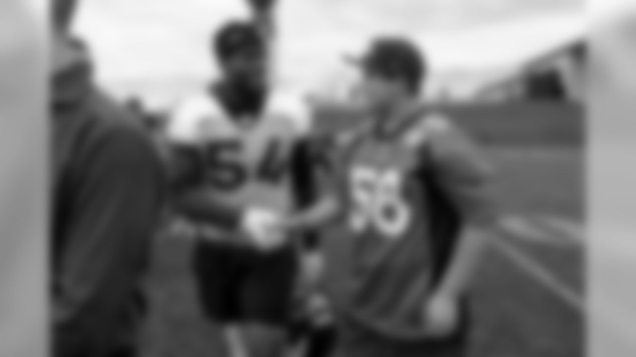 TJ, a 12-year-old fighting cystic fibrosis, wanted to be Von Miller for a day, and the Make-A-Wish Foundation helped make that dream come true on September 29, 2018. Here, TJ meets Brandon Marshall after practice.