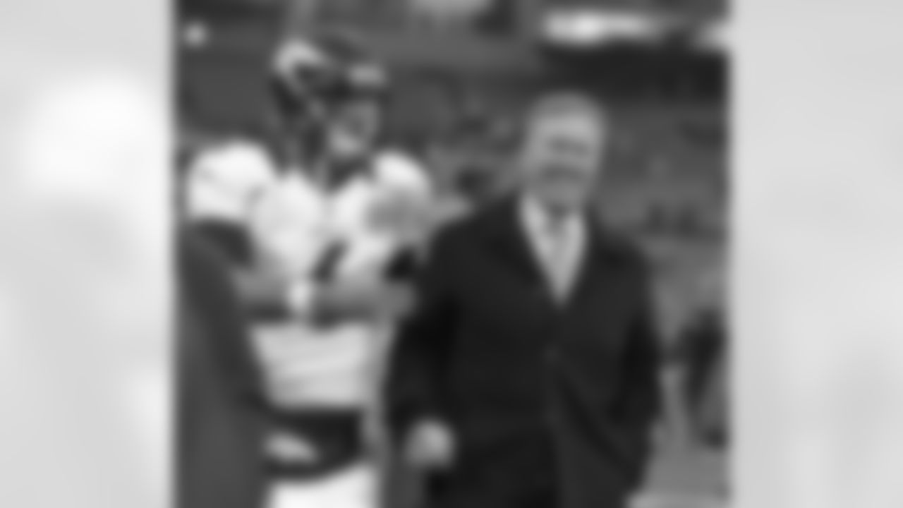 Executive Vice President of Football Operations John Elway smiles after the win.