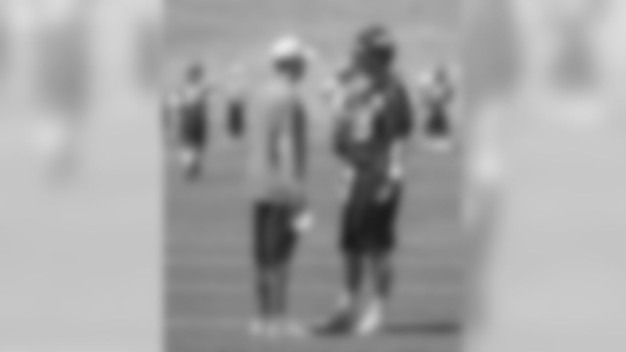 OC Adam Gase and QB Peyton Manning