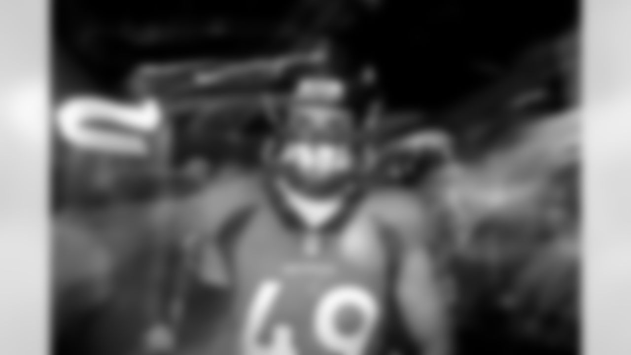 Alex Singleton in the tunnel during player and team introductions before the Broncos' Week 7 game against the New York Jets at Empower Field at Mile High in Denver, Colorado on October 23, 2022. (Photo by Ben Swanson)