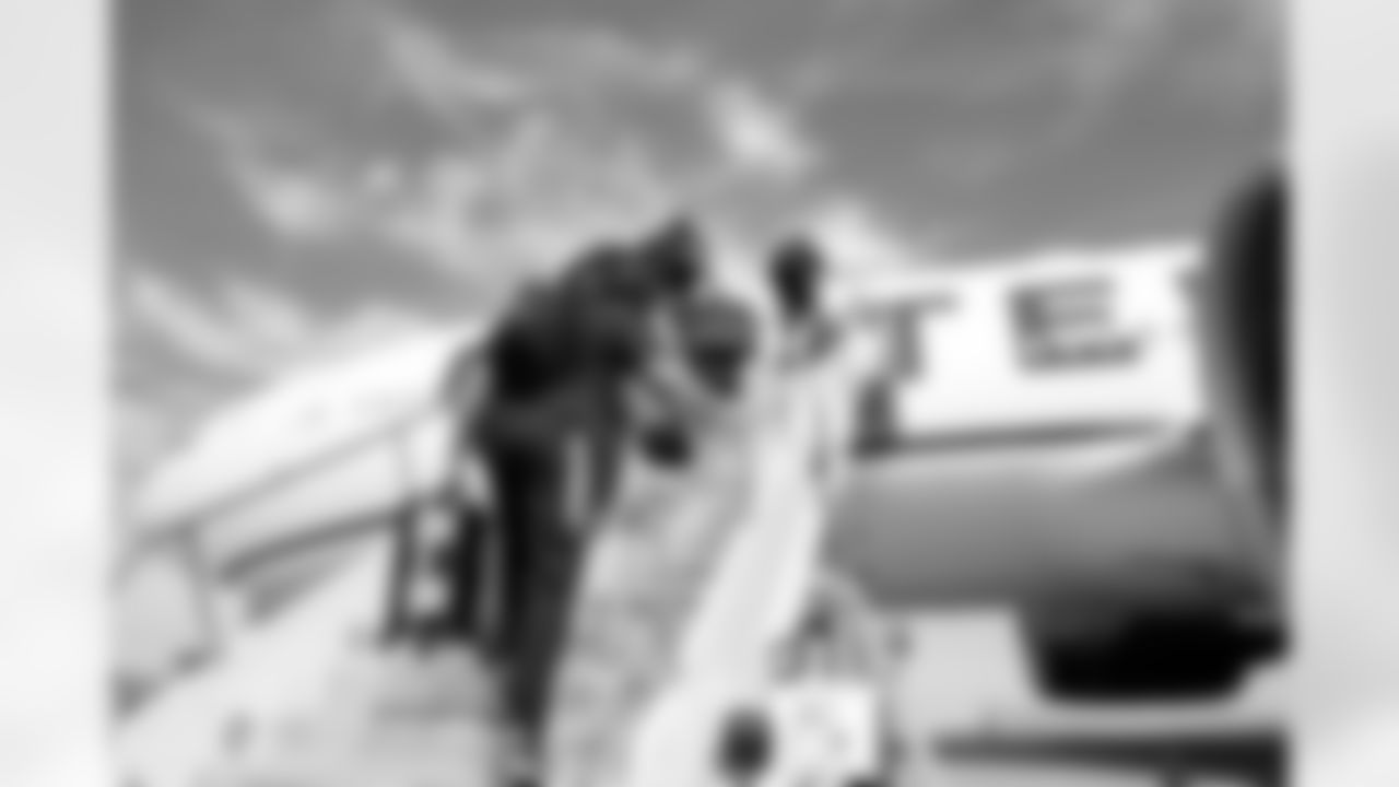 Eric Saubert on the tarmac at Denver International Airport on September 11, 2021 during the team's travel to New York for a Week 1 game against the Giants. (Photo by Joe Abdellah)
