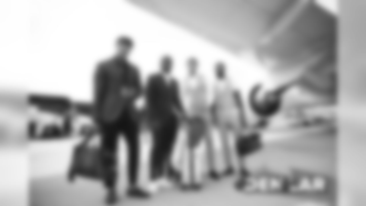 Su'a Cravens, Kareem Jackson, Justin Simmons and De'Vante Bausby board the plane at Signature Aviation in Denver, Colorado, August 23, 2019.
Photo by Gabriel Christus