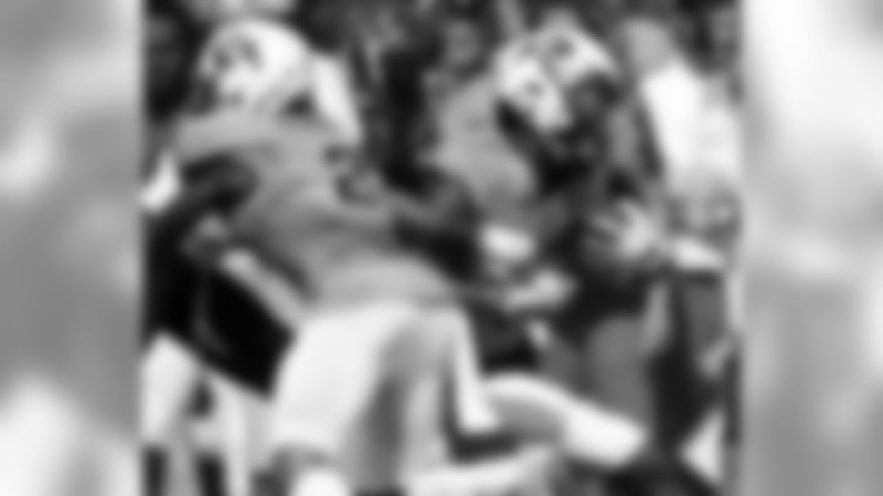 Colorado wide receiver Juwann Winfree, right, is pushed out of bound after pulling in a pass by Texas State cornerback JaShon Waddy, center, as he is blocked by Colorado wide receiver Devin Ross in the second half of an NCAA college football game Saturday, Sept. 9, 2017, in Boulder, Colo. Colorado won 37-3. (AP Photo/David Zalubowski)