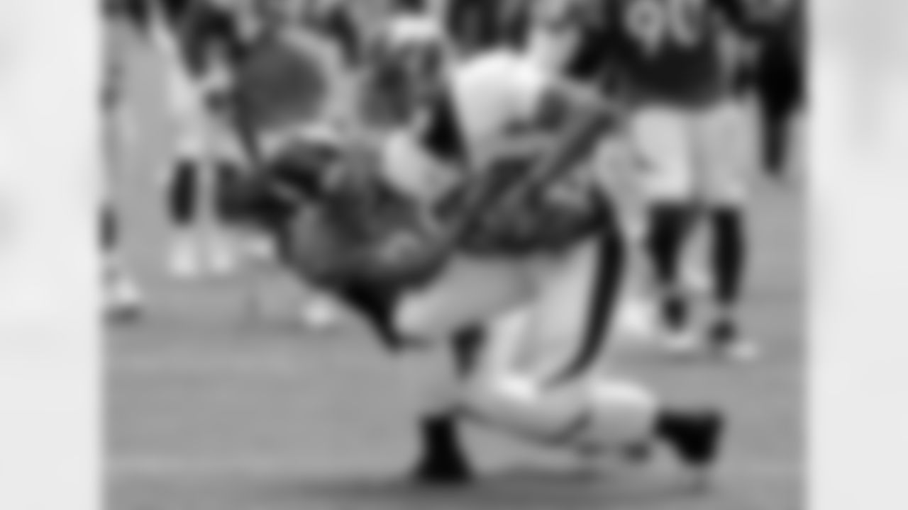 Ball hangs on to a catch.