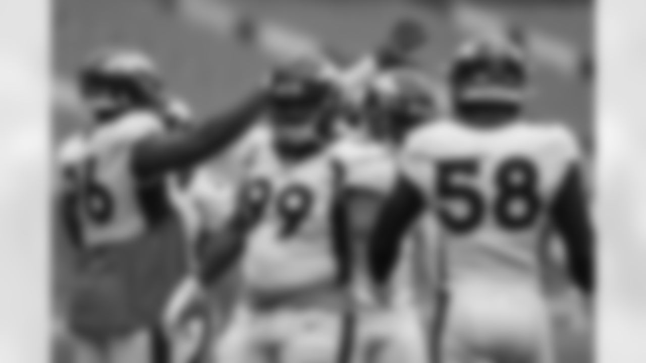 Jurrell Casey and Von Miller during practice on Day 12 of training camp at Empower Field at Mile High on August 29, 2020. (Photo by Ben Swanson)