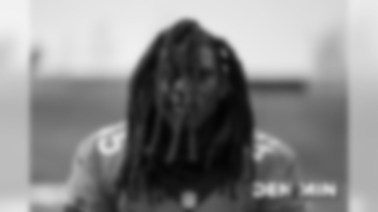 Alexander Johnson's hair falls in front of his face at practice at UCHealth Training Center on November 15, 2019. (Photo by Ben Swanson)