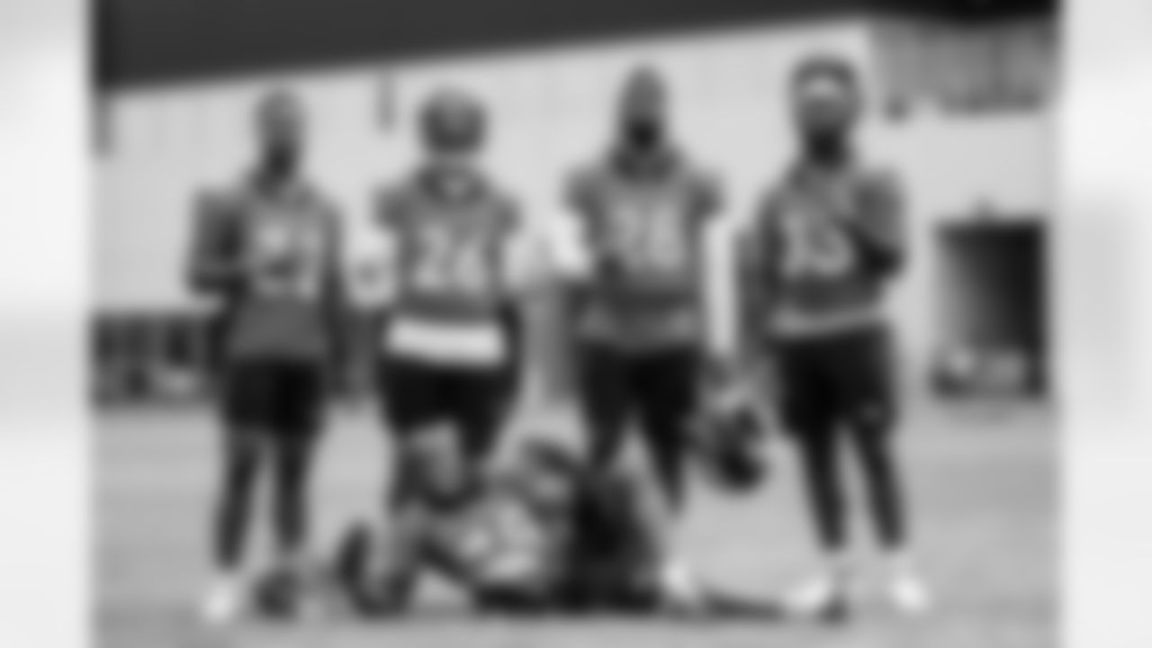 LeVante Bellamy, Mike Boone, Royce Freeman, Javonte Williams and Damarea Crockett poses for a photo after the 10th day of OTA practices at UCHealth Training Center on June 10, 2021. (Photo by Ben Swanson)
