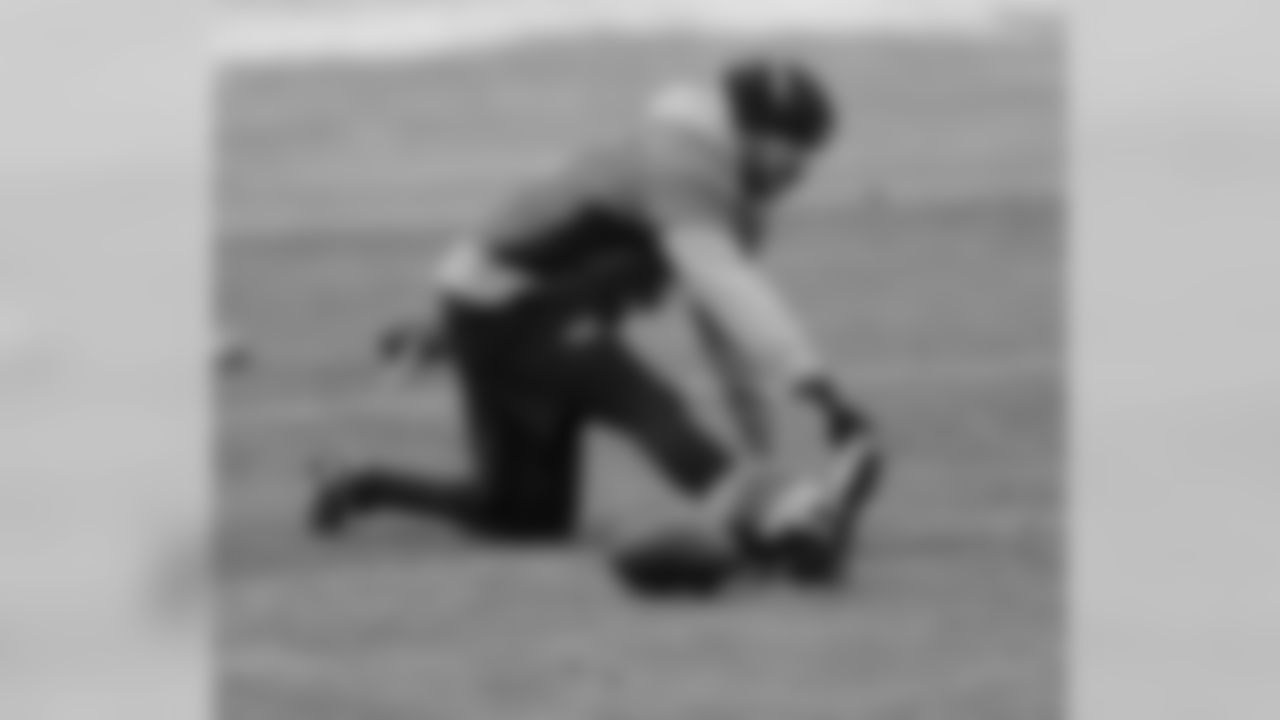 K Matt Prater stretches before practice.