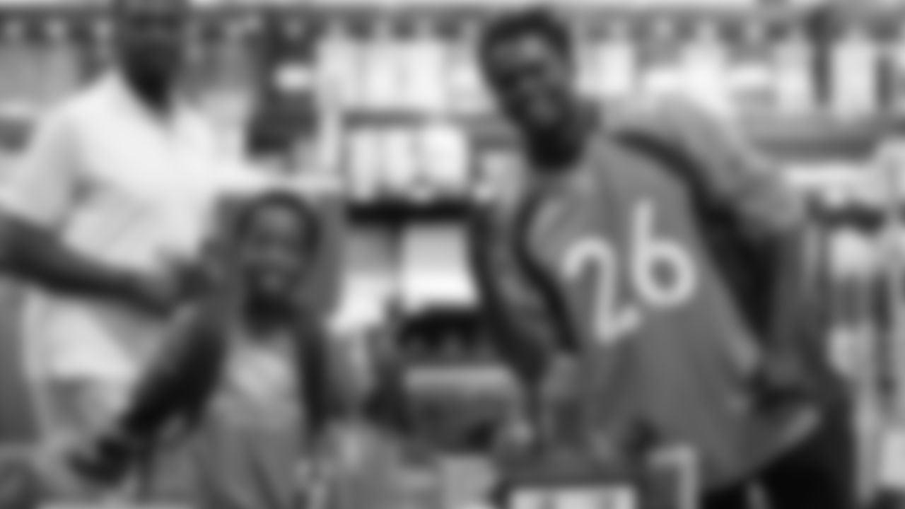 Isaac Yiadom with kids from the Denver Broncos Boys & Girls Club during the fourth annual Back to School with the Broncos shopping spree at King Soopers on July 16, 2019.