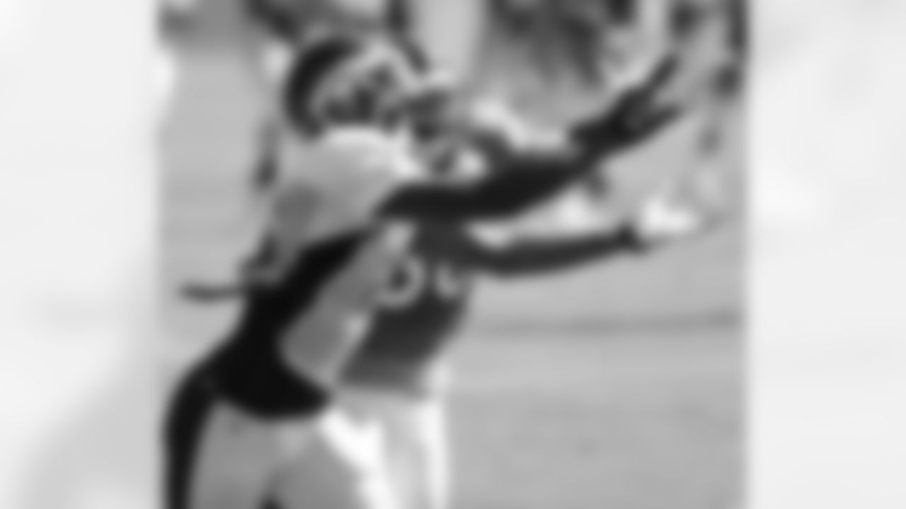 The two 2013 draft picks fight for the ball.