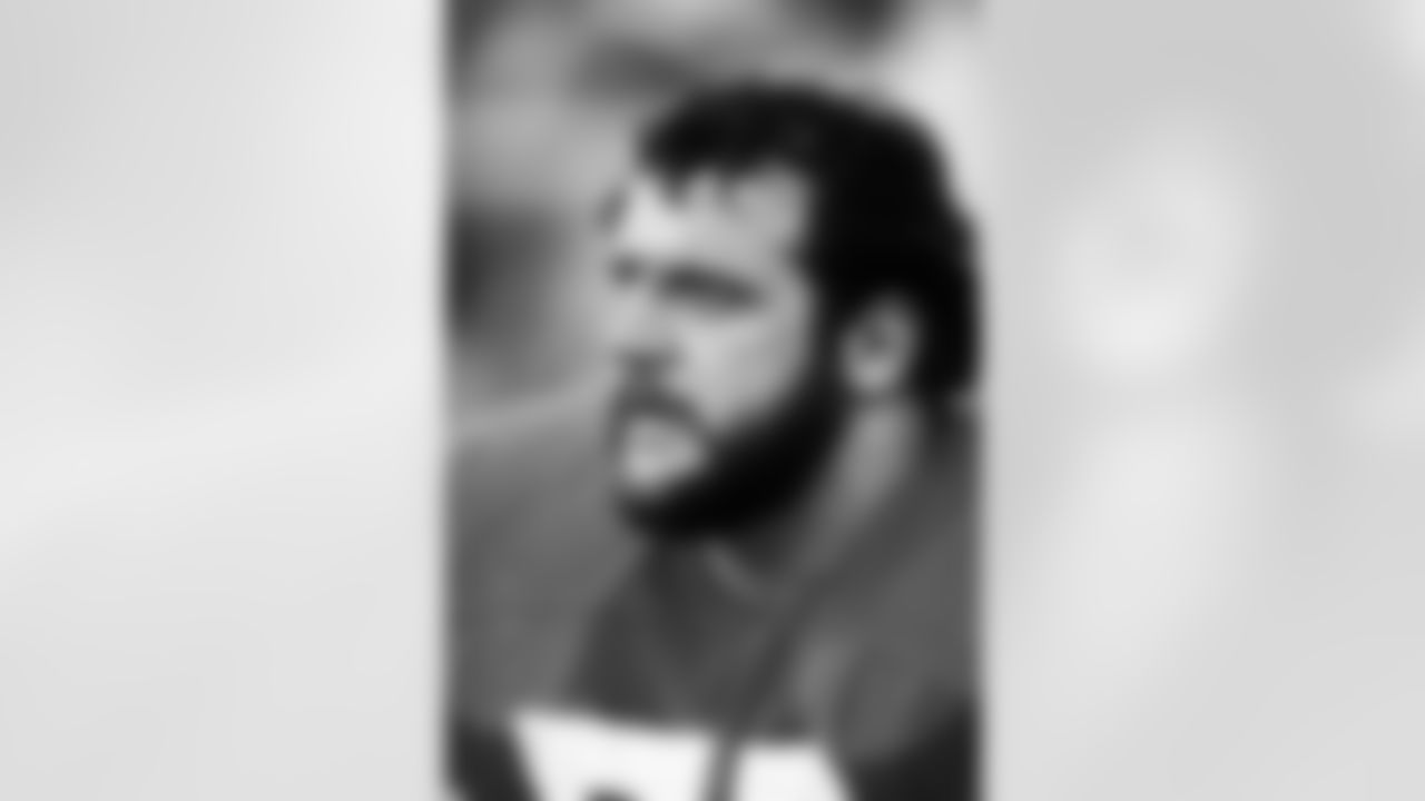Denver Broncos defensive end Lyle Alzado (77) watches from the sideline during an NFL game at Mile High Stadium in 1978. (Peter Read Miller via AP)