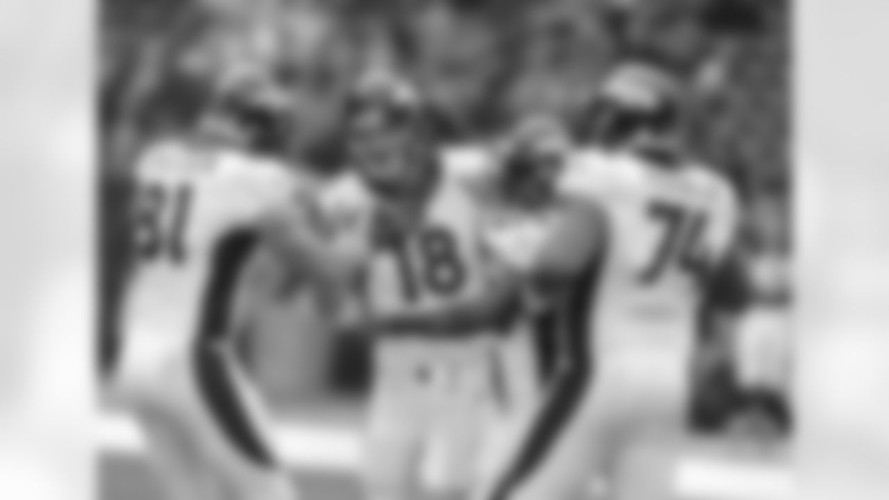 Manning Celebrates with Teammates