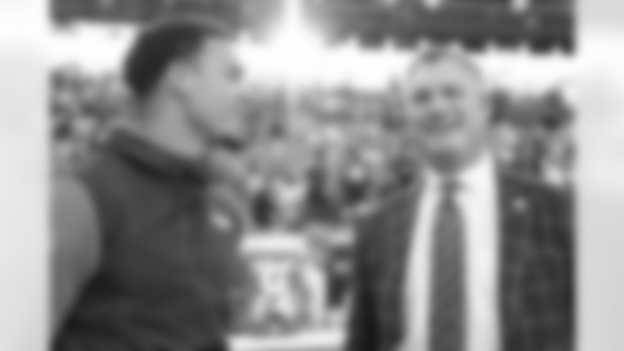 Justin Simmons with 49ers general manager John Lynch during warmups before the Broncos' Week 3 game against the San Francisco 49ers at Empower Field at Mile High in Denver, Colorado on September 25, 2022. (Photo by Ben Swanson)