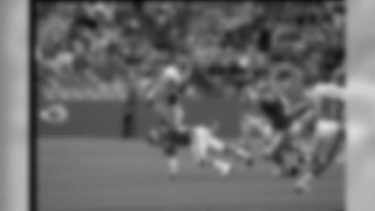 Gerald Willhite (1982 - first round, 21st overall) leaps over a Kansas City defender during a game on Sept. 18, 1988.