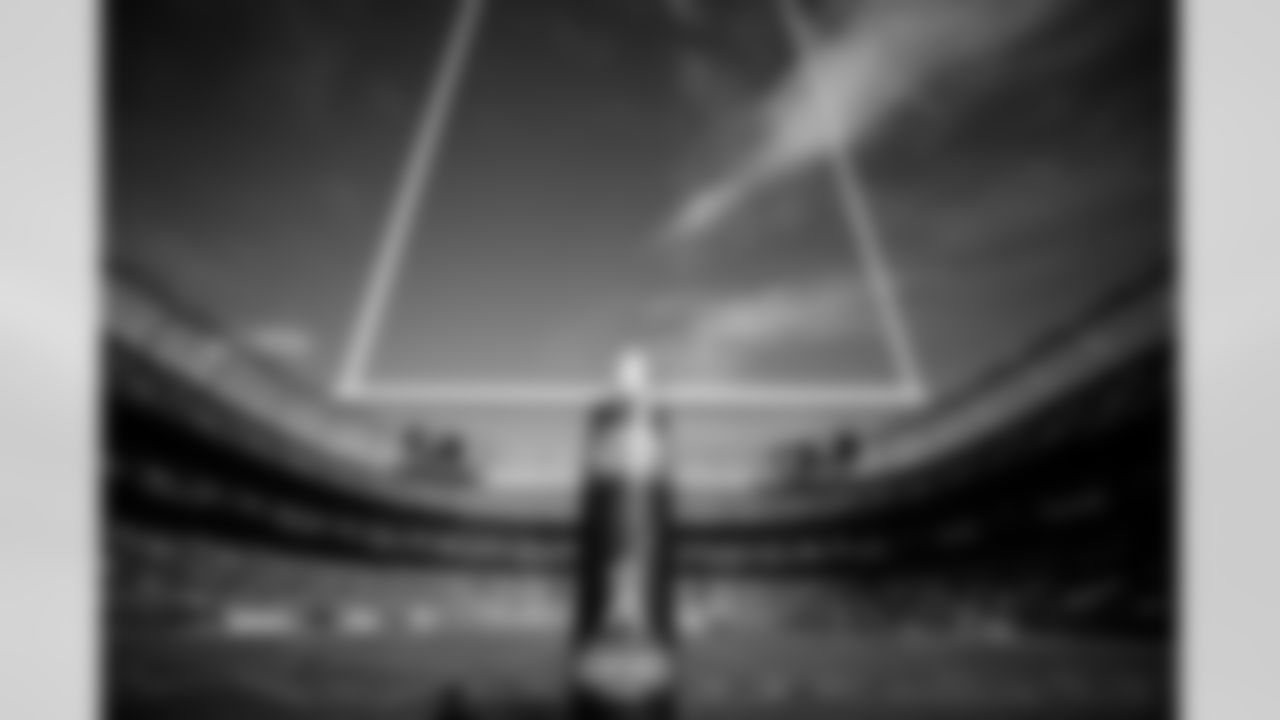 Salute to Service signage on a goal post before the Broncos' Week 10 game against the Philadelphia Eagles at Empower Field at Mile High in Denver, Colorado on November 14, 2021. (Photo by Ben Swanson)