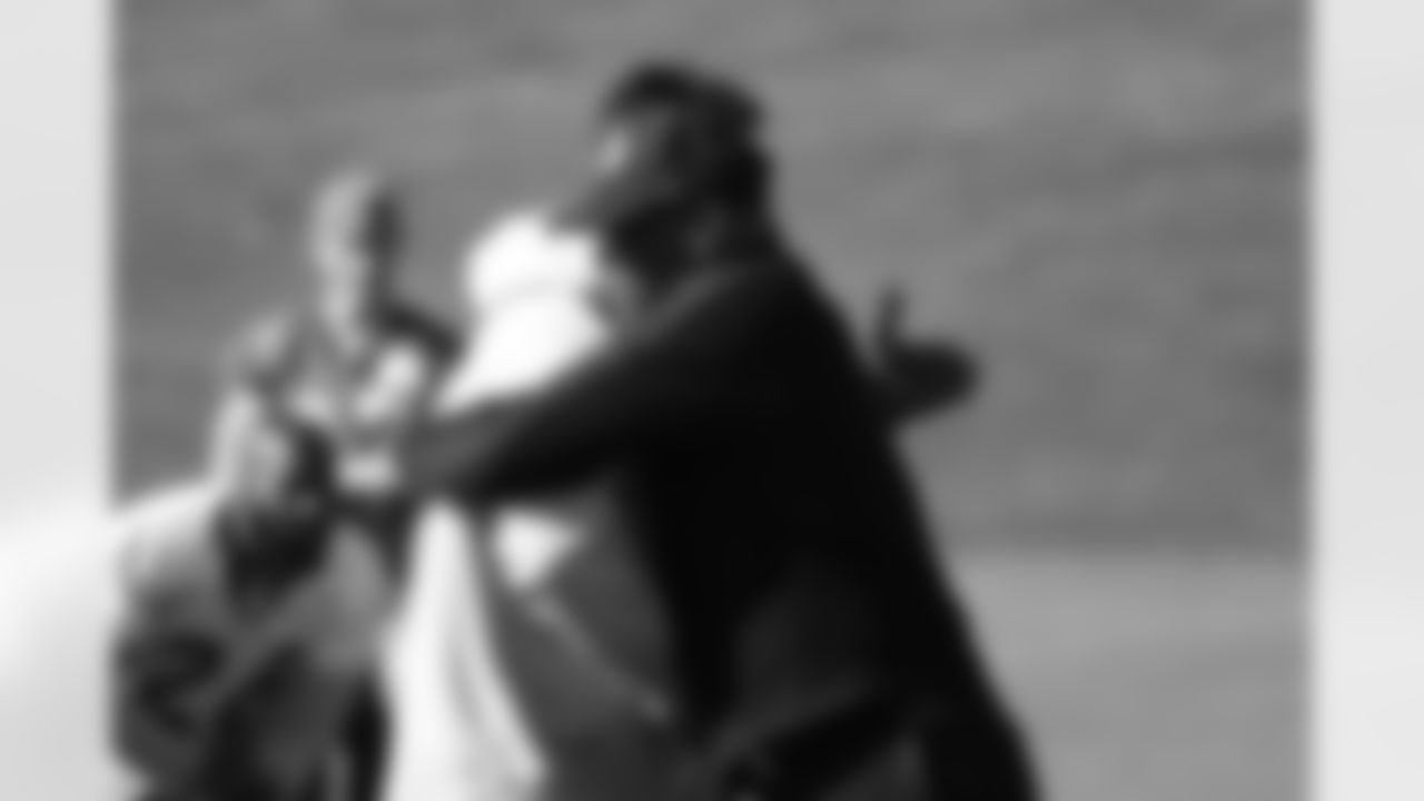 Ring of Fame former running back Floyd Little and Head Coach Gary Kubiak at a Ring of Fame meeting [before the Ring of Fame weekend] after a Saturday walkthrough on October 23, 2016. (Caroline Deisley)