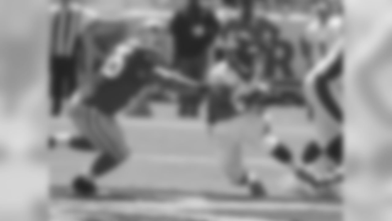 RB C.J. Anderson and 49ers LB Ahmad Brooks