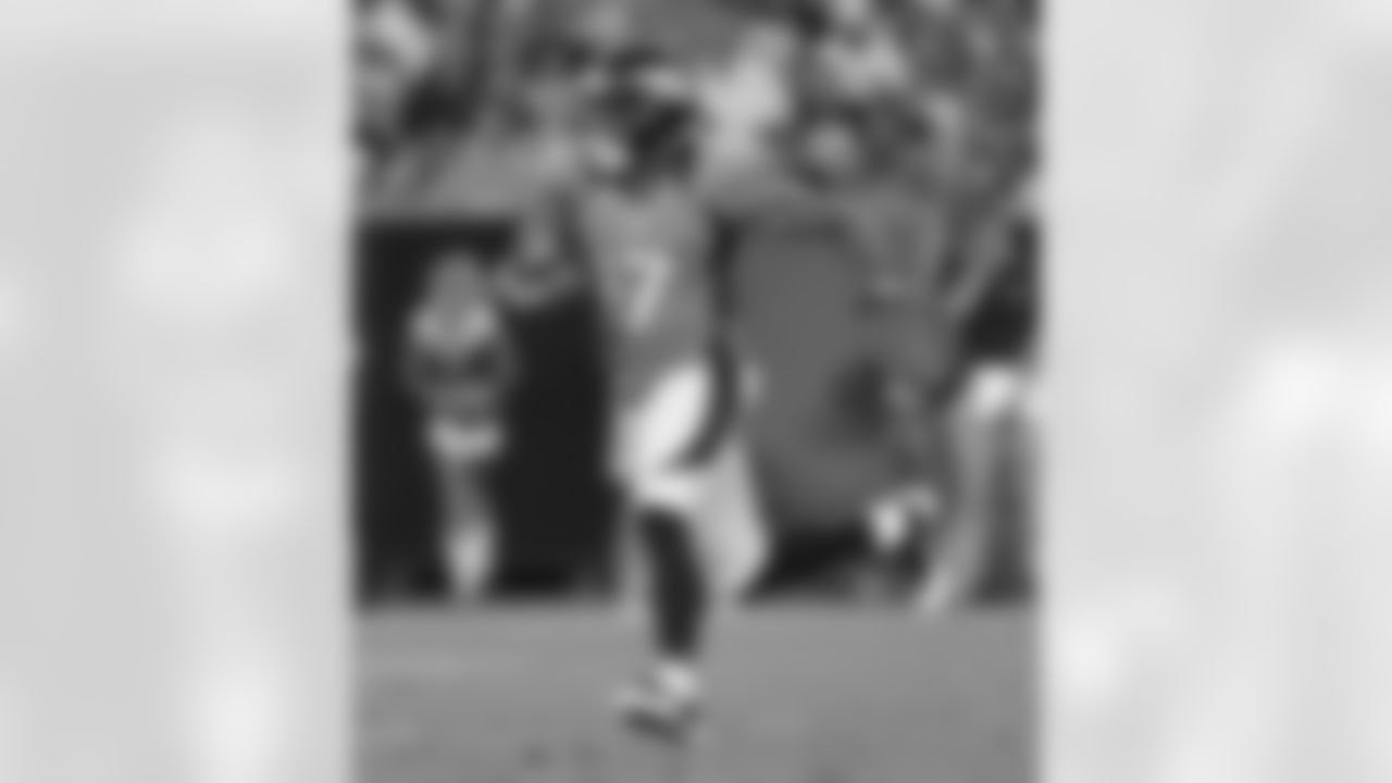 Wide receiver Andre Caldwell returns a kickoff.
