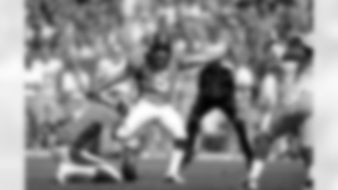 Kicker Matt Prater boots the football.