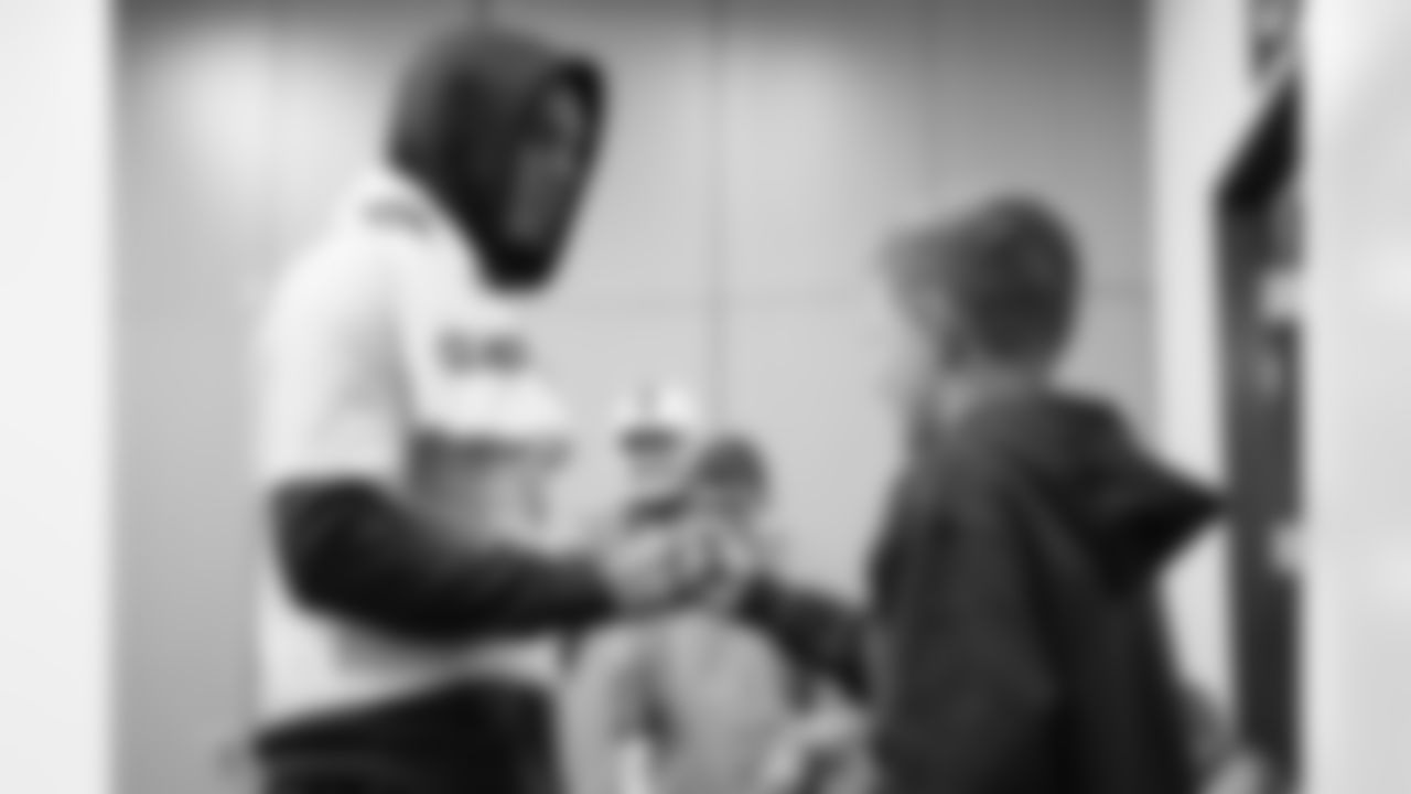 Justin Simmons during a Make-A-Wish visit from Logan at Centura Health Training Center in Englewood, Colorado on October 28, 2023. Photo by Ben Swanson / Denver Broncos