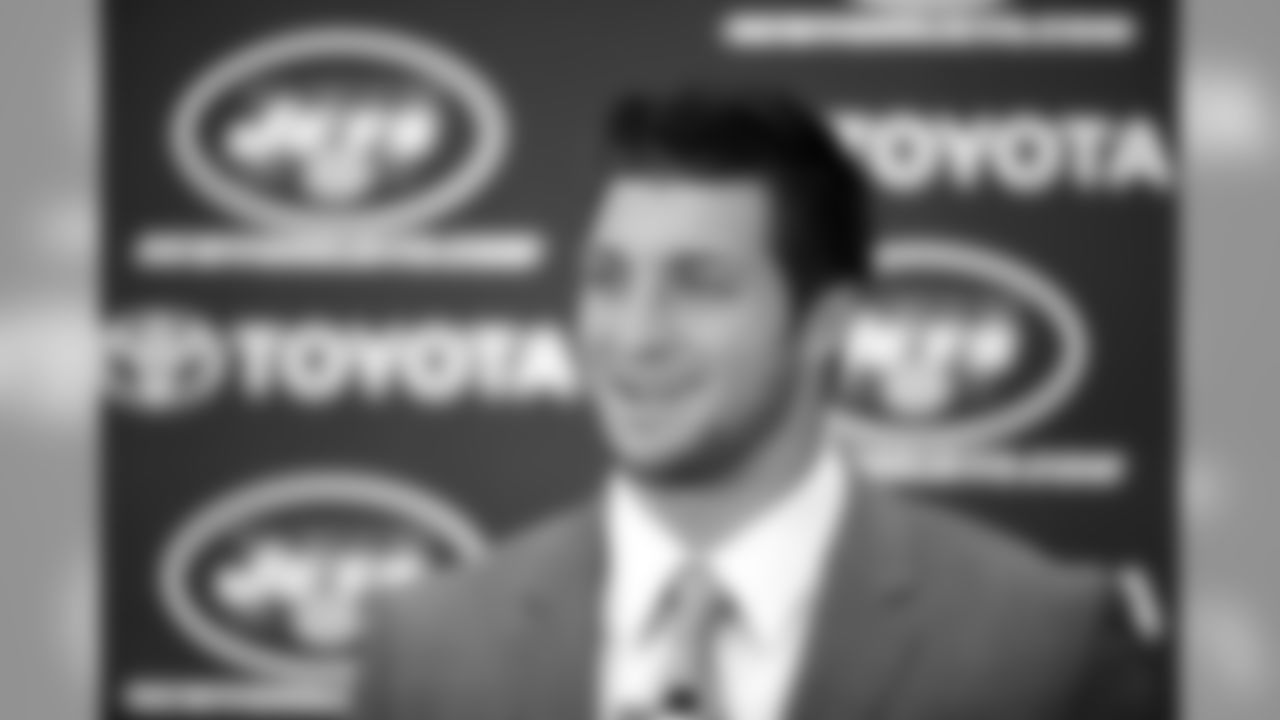 After signing Manning, the Broncos received two draft picks in exchange for QB Tim Tebow.