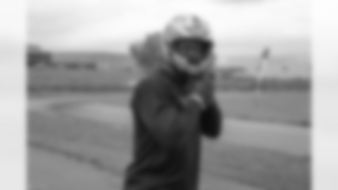 Kenny Anunike gets his helmet on before stepping on the track.