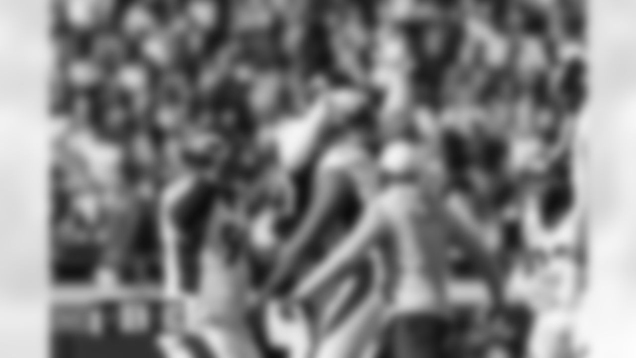 Mike Purcell, Eyioma Uwazurike and others during the Broncos' Week 17 game against the Kansas City Chiefs at GEHA Field at Arrowhead Stadium in Kansas City, Missouri on January 1, 2023. Photo by Gabriel Christus