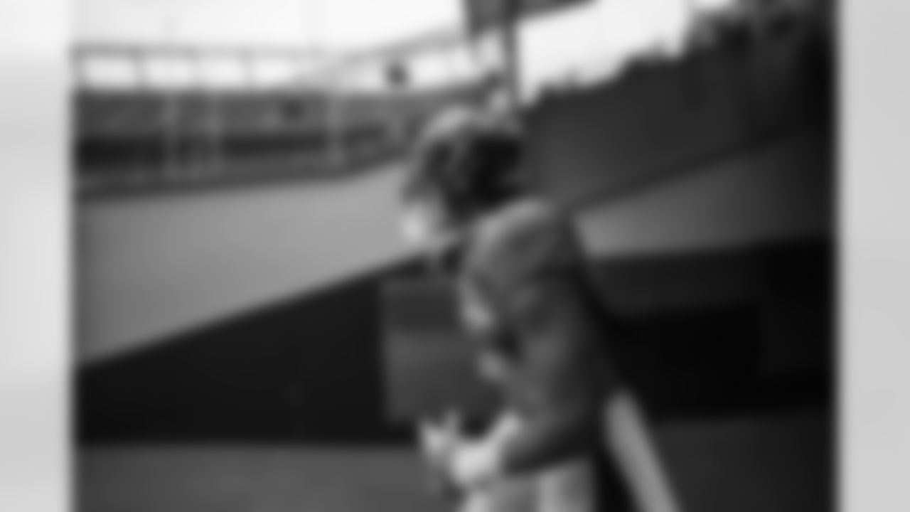 Phillip Lindsay runs out of the tunnel before practice on Day 12 of training camp at Empower Field at Mile High on August 29, 2020. (Photo by Ben Swanson)