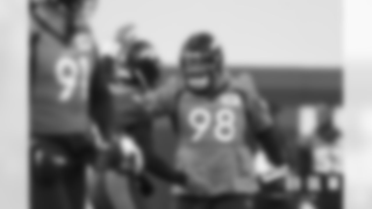 Russell Wilson and Mike Purcell during practice on Friday, December 2, 2022 at UCHealth Training Center in Englewood, Colorado.
Photo by Gabriel Christus/Denver Broncos