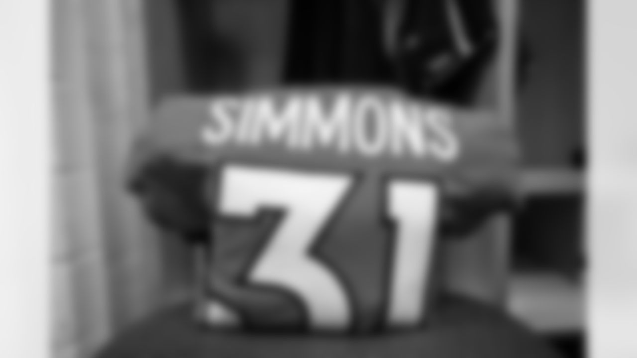 Justin Simmons's jersey in the locker room before the Broncos' preseason Week 3 game against the Los Angeles Rams at Empower Field at Mile High in Denver, Colorado on August 28, 2021. (Photo by Ben Swanson)