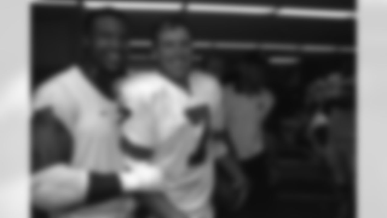 John Elway and Steve Atwater were all smiles in the locker room after a win over the Seattle Seahawks on September 8, 1996. (Broncos photo archive)