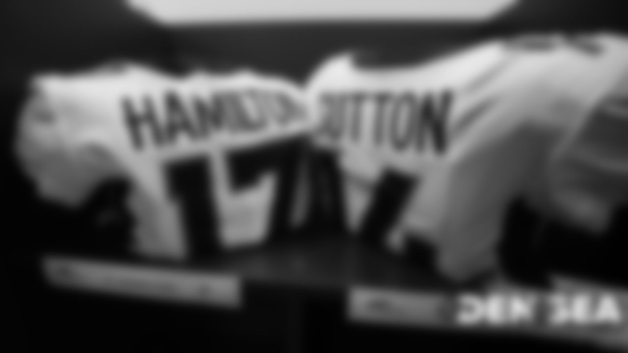 DaeSean Hamilton's and Courtland Sutton's jerseys in the visiting locker room for the Broncos' preseason game against the Seattle Seahawks at CenturyLink Field on August 8, 2019.
