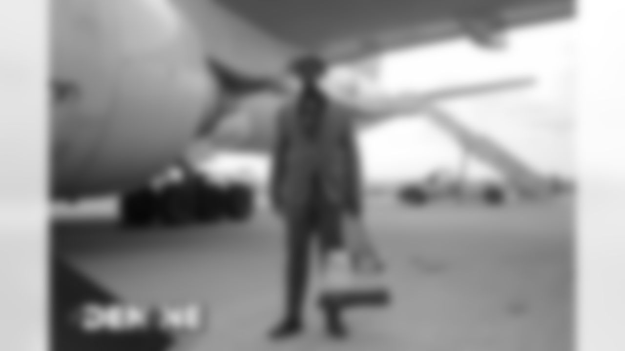 Alexander Johnson on the tarmac at Denver International Airport on October 17, 2020 during the team's travel to New England for a Week 6 game against the Patriots. (Photo by Ben Swanson)