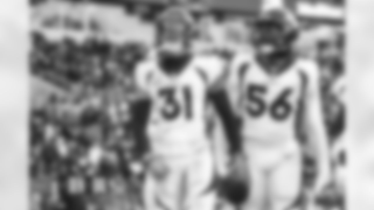 Justin Simmons and Baron Browning during the Broncos' Week 13 game against the Baltimore Ravens at M&T Bank Stadium in Baltimore, Maryland on December 4, 2022. (Photo by David Dermer)