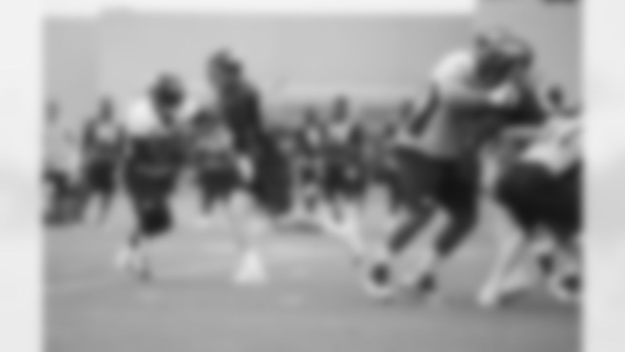 Hillman takes the handoff from Manning.