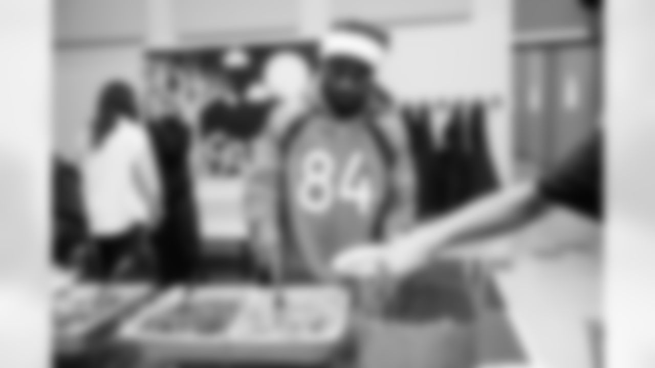 The Broncos host a holiday event for children in the juvenile detention center at the Marvin W. Foote Youth Services Center in Centennial, Colorado on December 20, 2022. Photo by Amanda Gerlach/DenverBroncos.com
