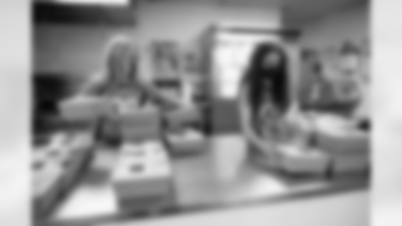 Denver Broncos Cheerleaders and Miles the Mascot delivery more than 1,800 gourmet boxed lunches, prepared by Epicurean Catering, to healthcare professionals, local nonprofits, first responders, teachers, and essential and frontline workers.