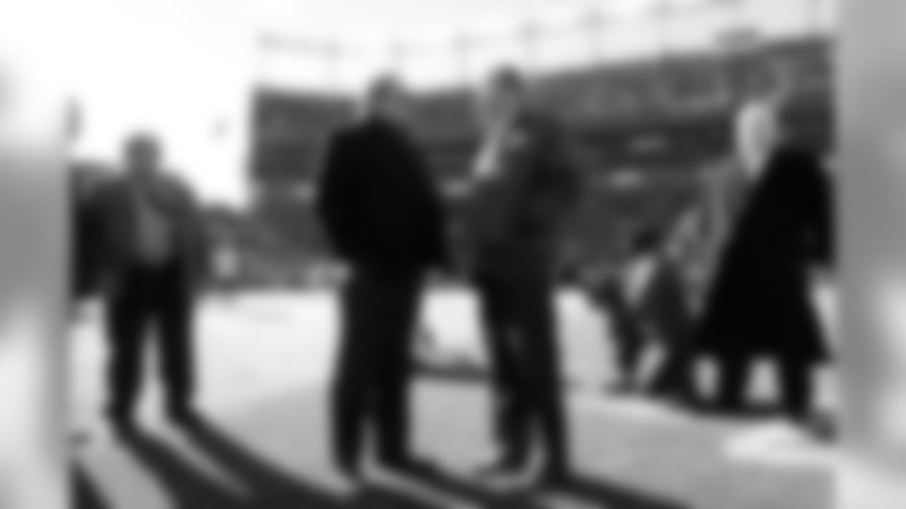 Dean Spanos, Chairman of the Board and President of the San Diego Chargers, talks with Pat Bowlen, Owner and CEO of the Denver Broncos, before action against the San Diego Chargers in an AFC divisional playoff NFL game at Sports Authority Field in Denver, CO on January 12, 2014.
Photo by Gabriel Christus
