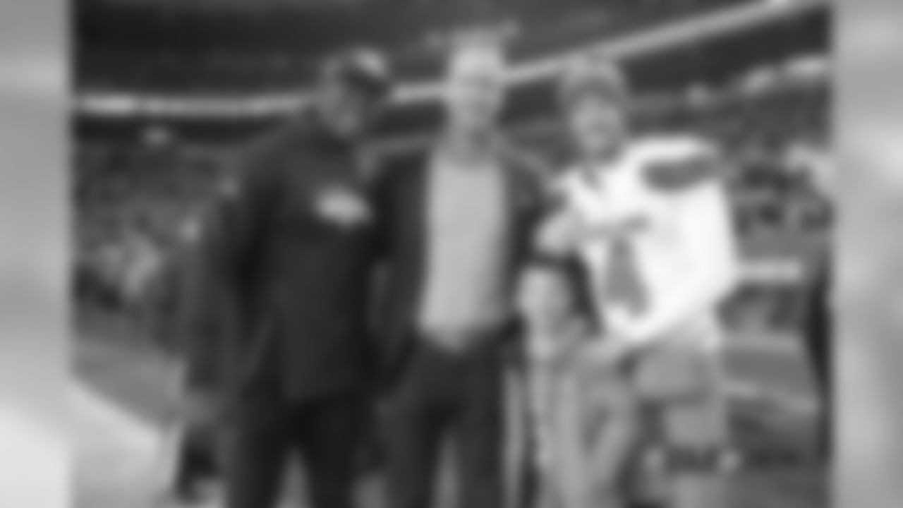 Pass Rush Consultant (and former outside linebacker) DeMarcus Ware, Peyton Manning, Manning's son Marshall, and Britton Colquitt before the Broncos' Week 15 game against the Cleveland Browns at Broncos Stadium at Mile High on December 15, 2018.