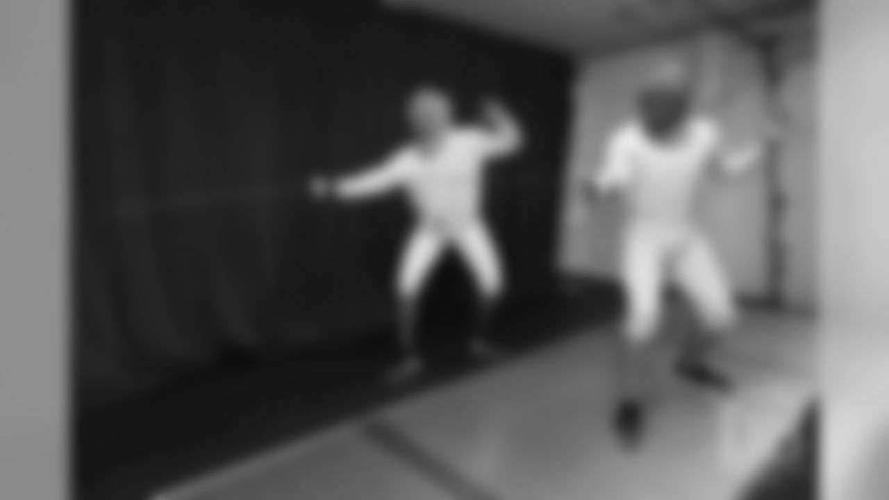 Brandon McManus and Casey Kreiter try their hands at fencing at the Denver Fencing Center on July 17, 2018.