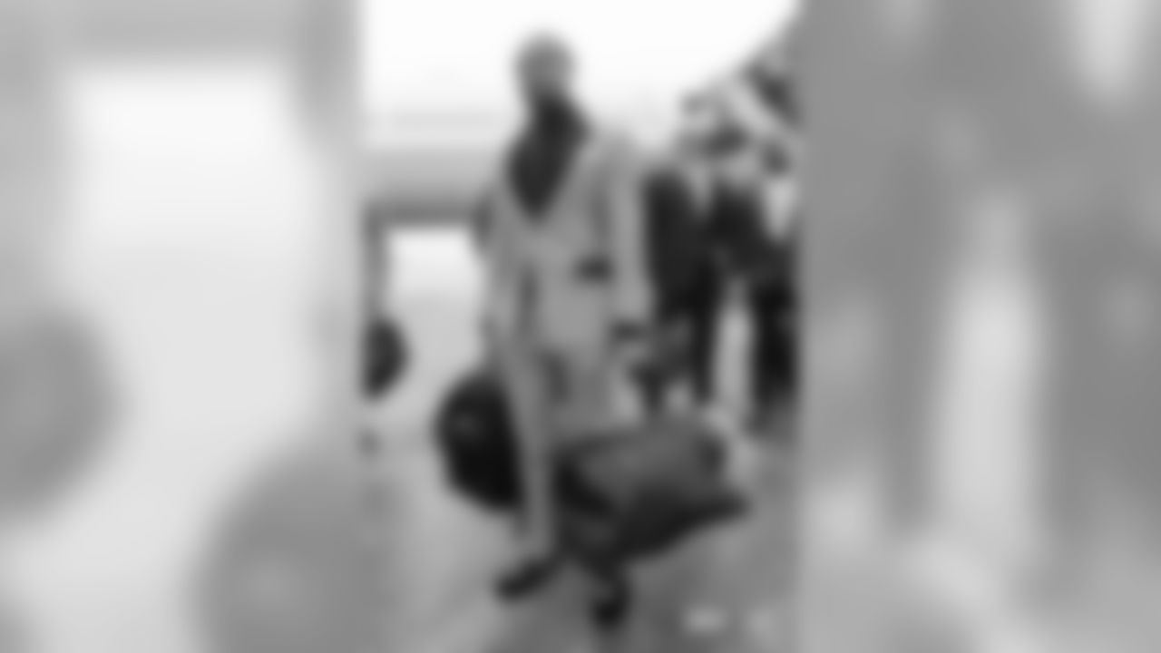 Bradley RobyÊwalks on the tarmac to the plane before the flight during the team's travel for their Week 11 game against the Los Angeles Chargers on November 17, 2018.