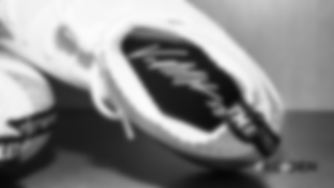 The interior of Von Miller's cleats, which includes his signature, in the locker room pregame before the Broncos' Week 4 game against the Kansas City Chiefs at Broncos Stadium at Mile High on October 1, 2018.